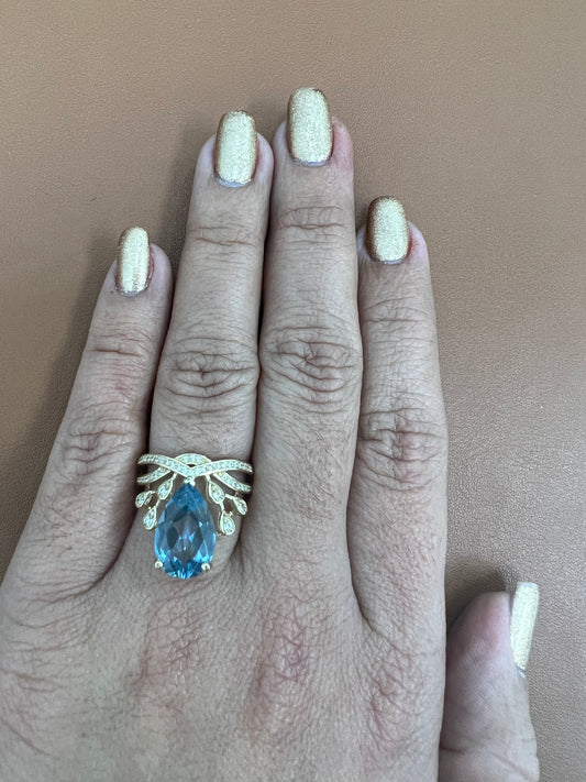 Anillo De Circonias Blancas Y Almerdra Azul 14K